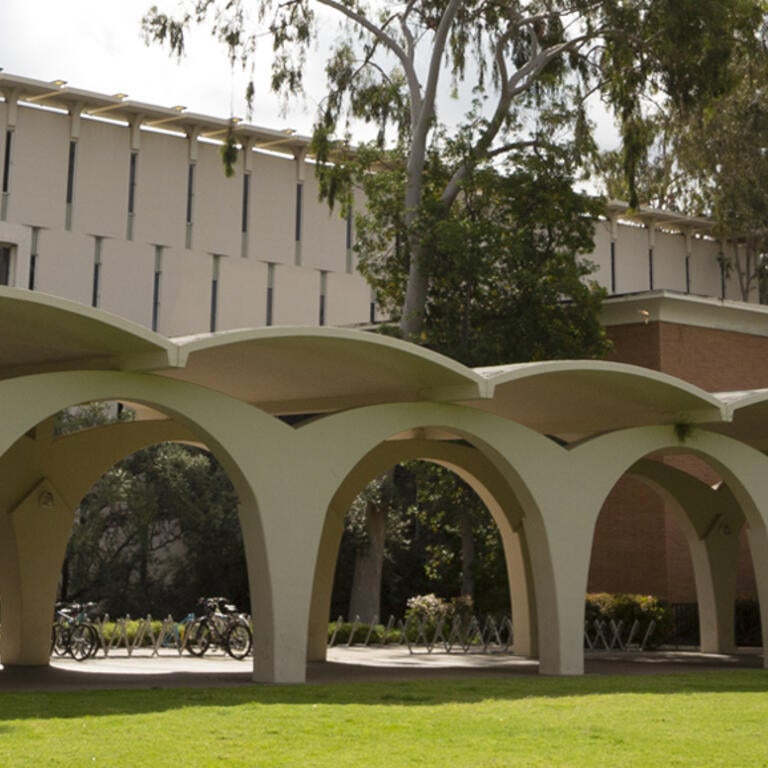 A view of the Tomás Rivera Library arches at the heart of the UCR campus.